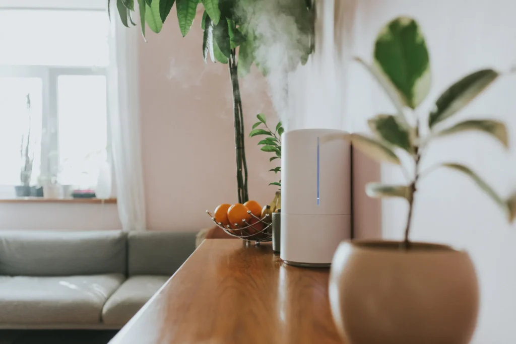 A white humidifier placed on the table in Topeka, Lawrence, KS